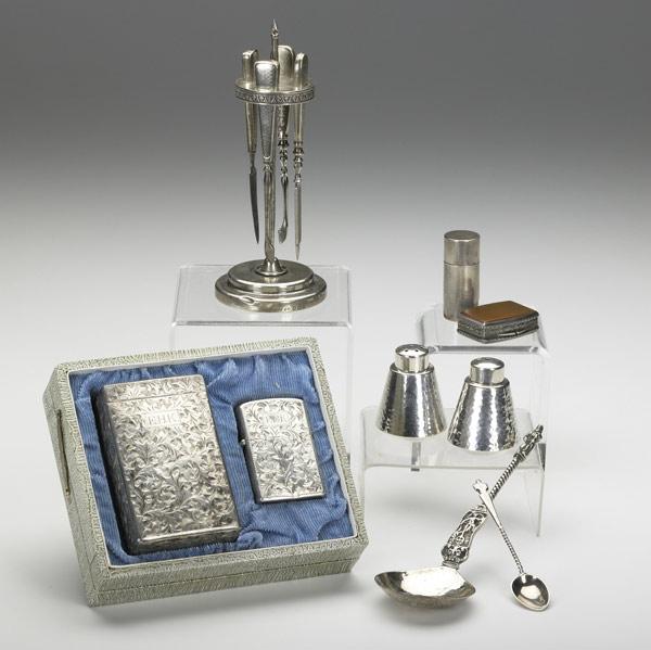 Appraisal: FOREIGN SILVER Thirteen pieces matched pair brilliant cut silver Zippo