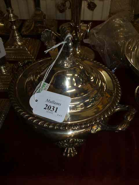 Appraisal: A PERUVIAN SILVER SAUCE TUREEN AND COVER two scrolling handles