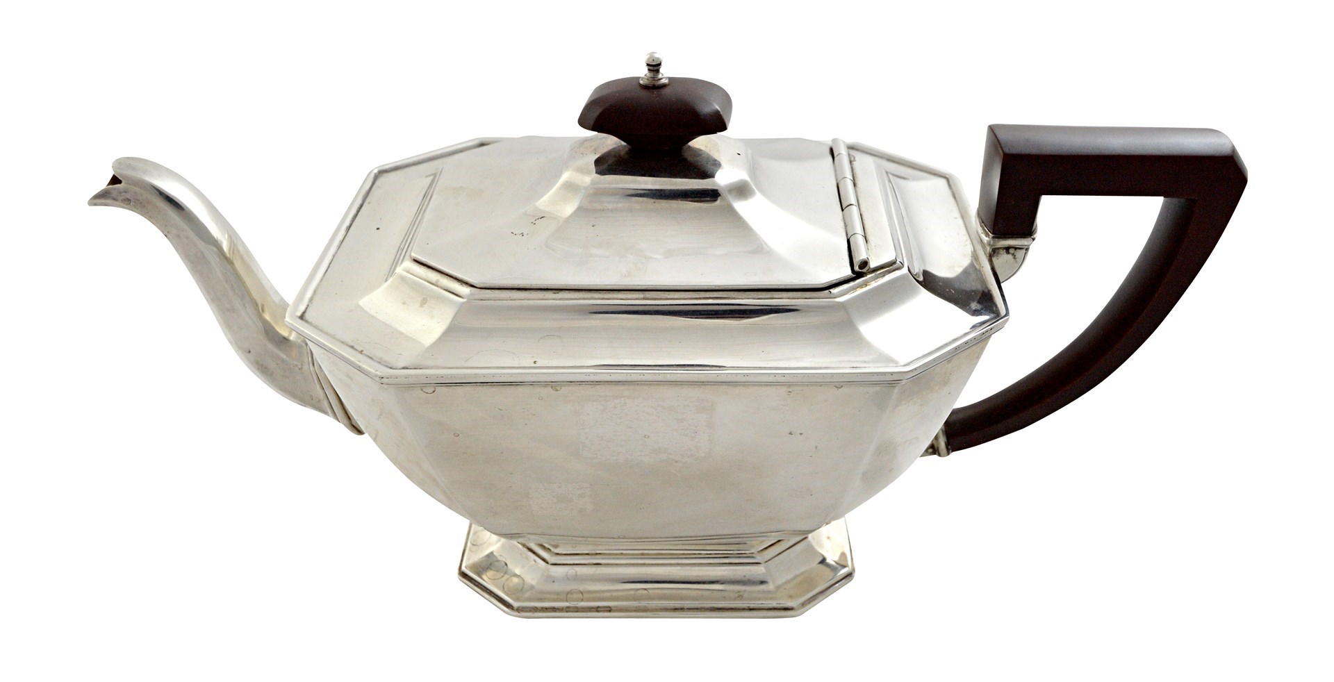 Appraisal: A silver teapot of cut cornered rectangular tapering form in