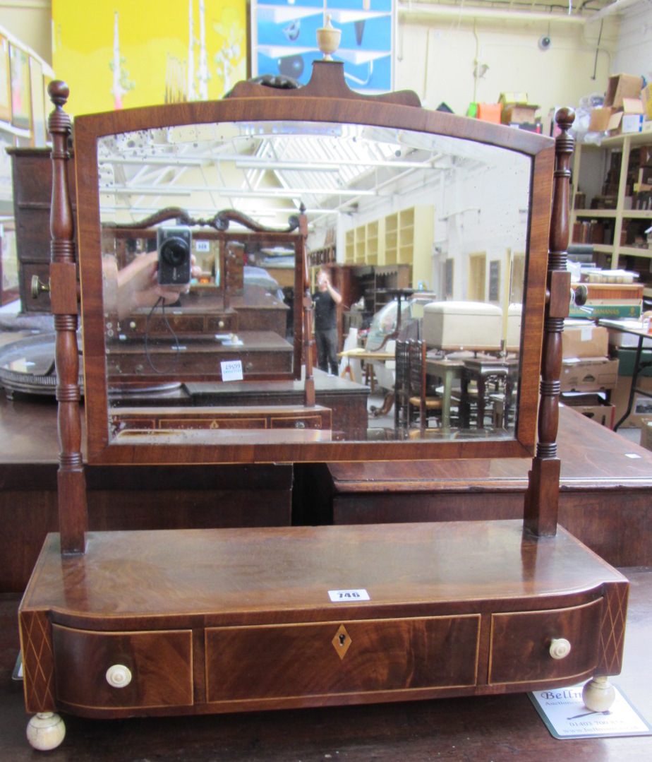 Appraisal: An early Victorian ivory mounted mahogany dressing table mirror with