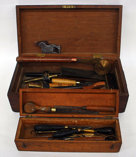 Appraisal: AN OLD MAHOGANY BOX CONTAINING A NUMBER OF TOOLS to