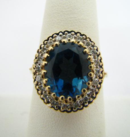 Appraisal: K Yellow Gold Blue Topaz Diamond Ring