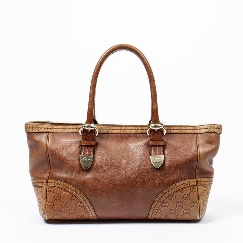 Appraisal: Gucci Signoria handbag in tan grained leather having dual rolled