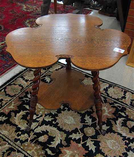 Appraisal: VICTORIAN OAK LAMP TABLE American c - The two-tier table