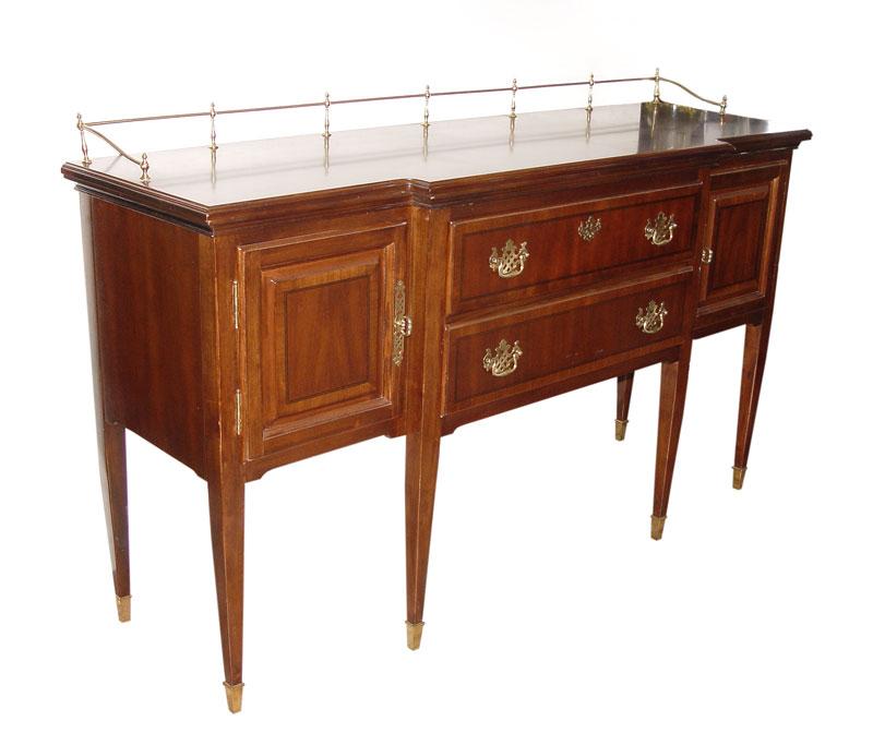 Appraisal: TRADITIONAL STYLE MAHOGANY VENEER SIDEBOARD central drawers flanked by single