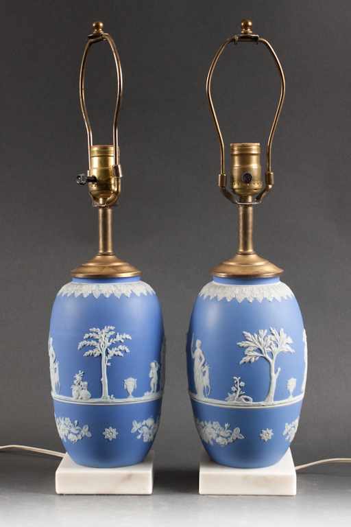 Appraisal: Pair of Wedgwood blue and white jasperware vases mounted as