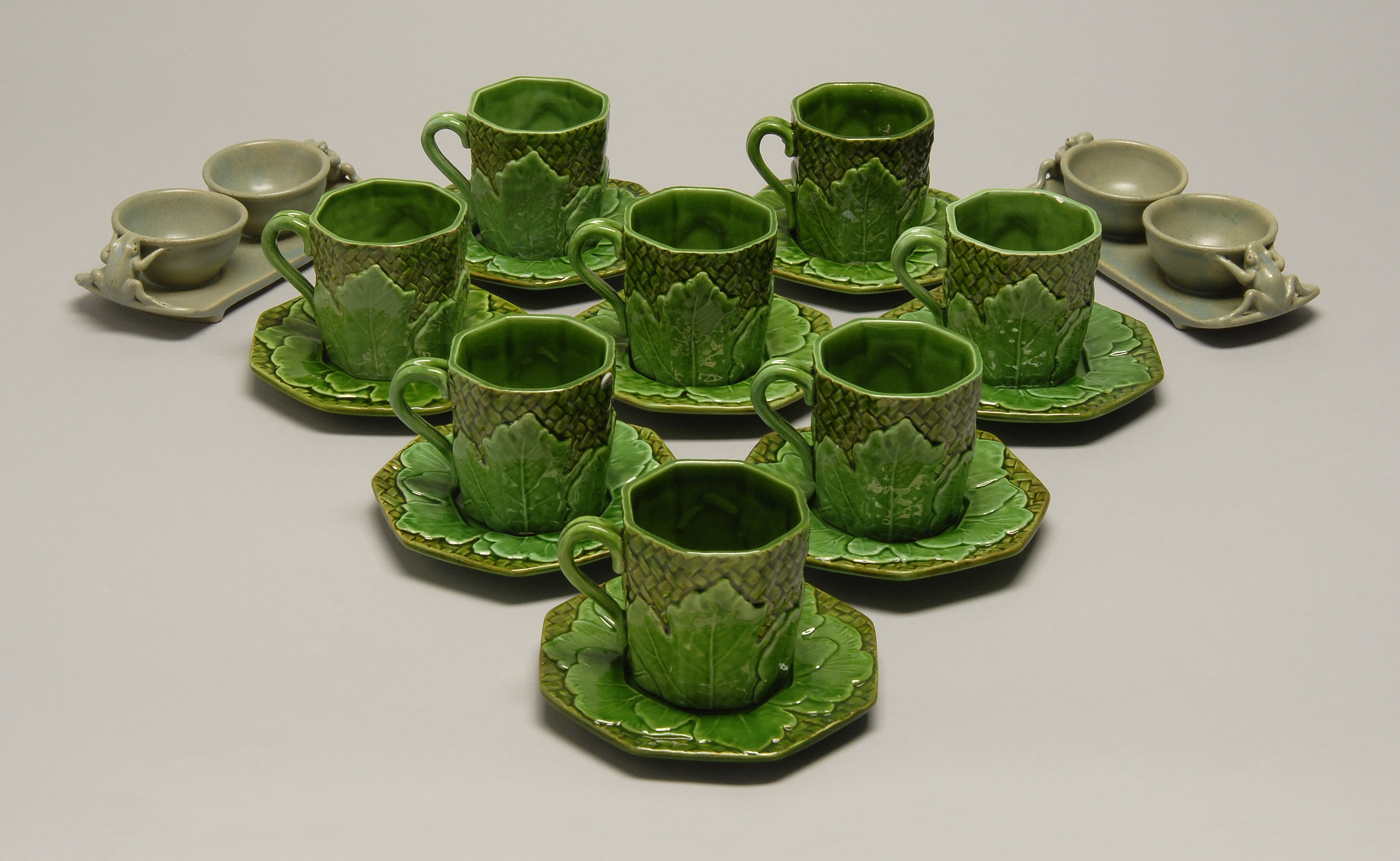 Appraisal: EIGHT BASSANO MAJOLICA CUPS SAUCERS Italy th CenturyEach octagonal with