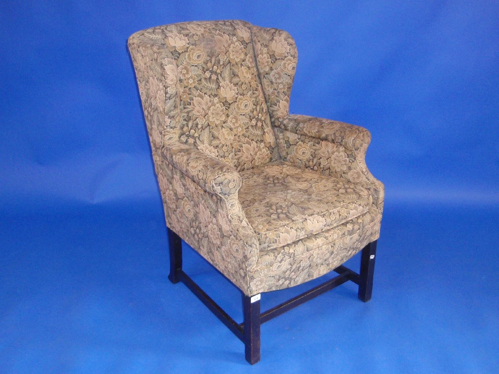 Appraisal: A Georgian style tapestry upholstered wing armchair