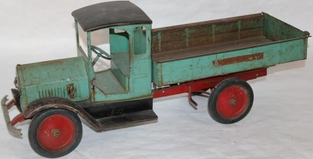 Appraisal: CA S STURDY TOY PRESSED STEEL DUMP TRUCK TEAL PAINTED