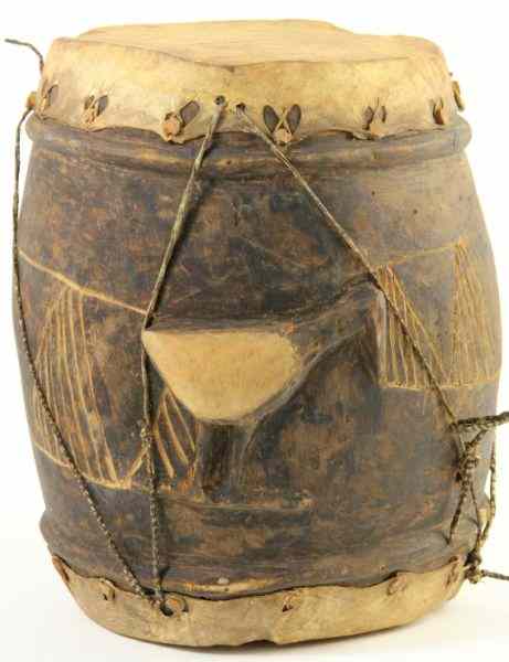 Appraisal: African Wooden Drum with Hidesearly th century with carved wood