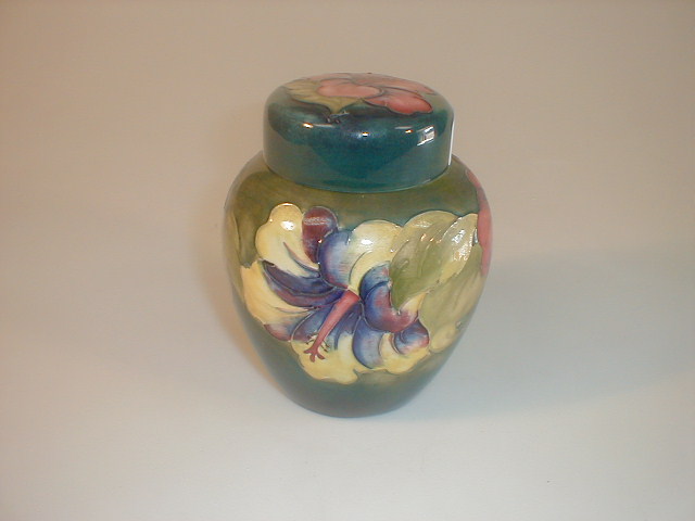 Appraisal: A Moorcroft pottery ginger jar and cover tube lined and