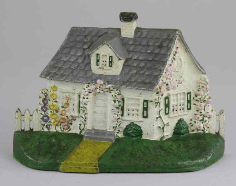 Appraisal: CAPE COD W PICKET FENCE DOORSTOP National Foundry marked ''