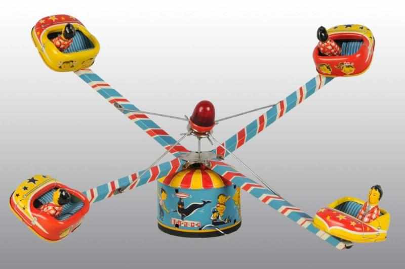 Appraisal: Tin Octopus Amusement Ride Battery-Operated Toy Description Japanese Working Made