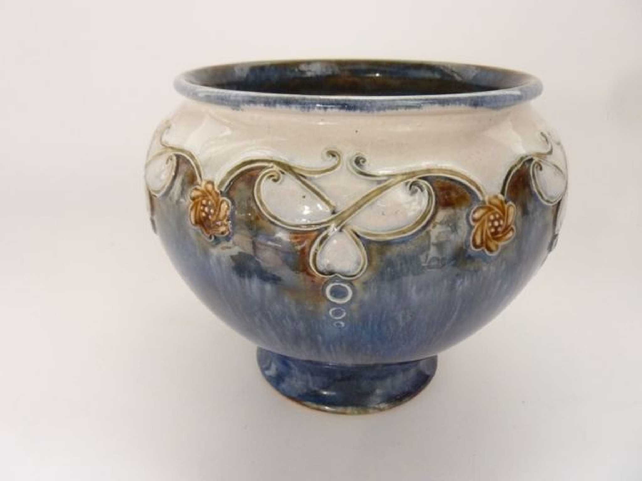 Appraisal: A Royal Doulton vase with moulded Art Nouveau motifs in