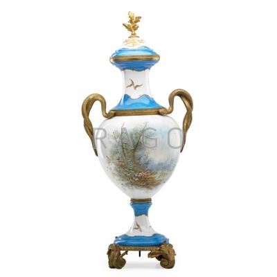 Appraisal: SEVRES Porcelain urn with snake handles and gilt metal mounts