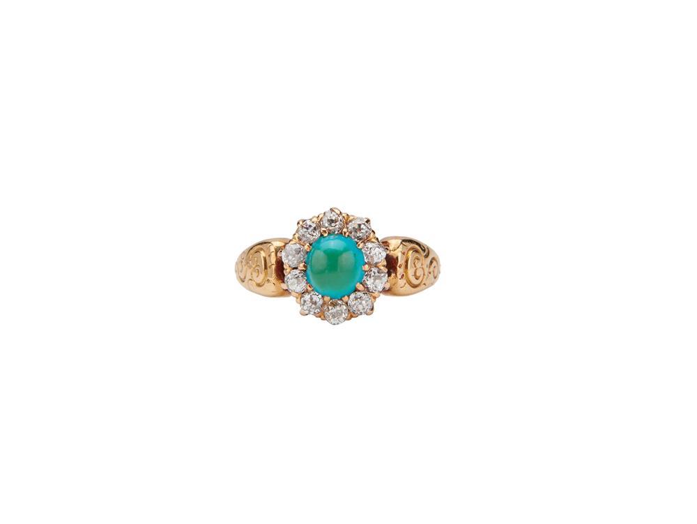 Appraisal: K Gold Diamond and Turquoise Ring centering an oval cabochon