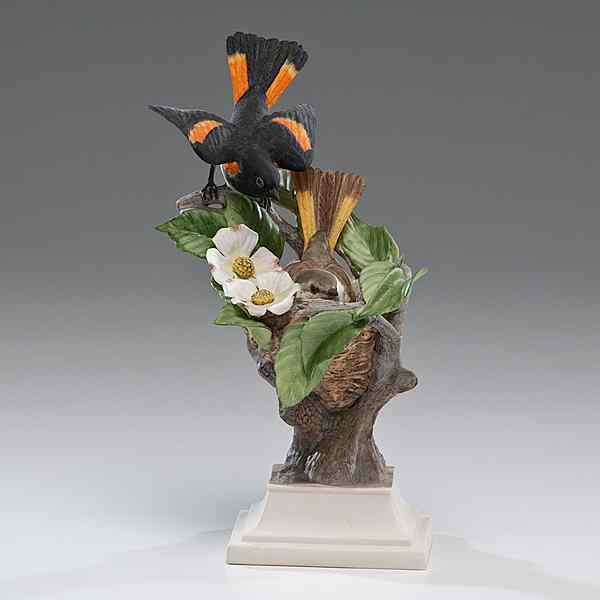 Appraisal: Boehm American Redstarts American A painted porcelain Boehm sculpture of