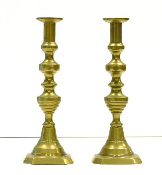 Appraisal: Pair of antique brass push-up candlesticks expected surface wear ''