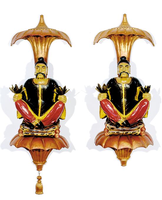 Appraisal: Pair chinoiserie figural candle sconces palm backplate supporting conforming bracket