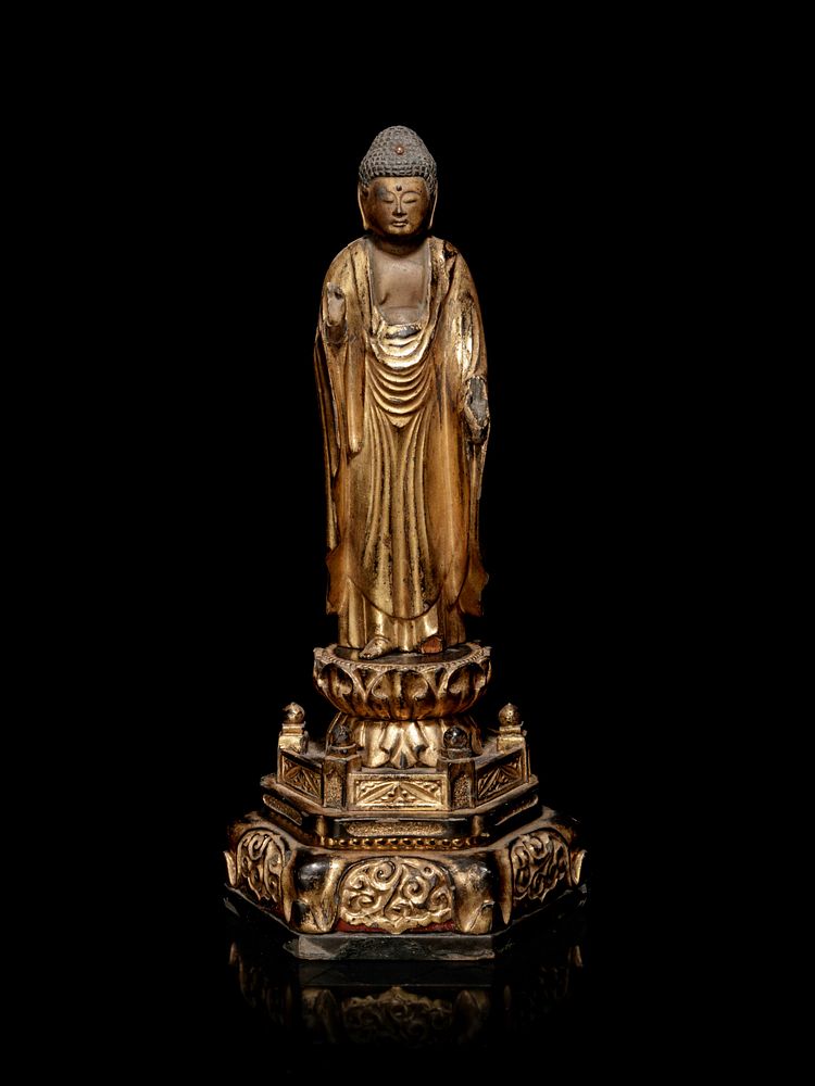 Appraisal: A Hardwood Shrine with a Gilt Wood Figure of Buddha