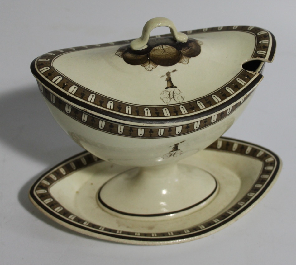 Appraisal: An thC Staffordshire creamware sauceboat on fixed stand the Neo-Classical