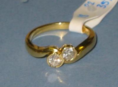 Appraisal: A TWO STONE DIAMOND RING the brilliant cut stones on