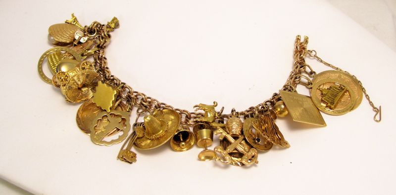 Appraisal: Ladies charm bracelet stamped kt yellow gold open double circular