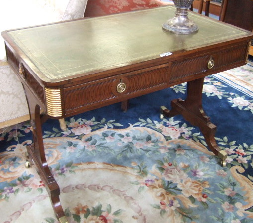 Appraisal: A Regency mahogany centre writing table the gilt tooled green