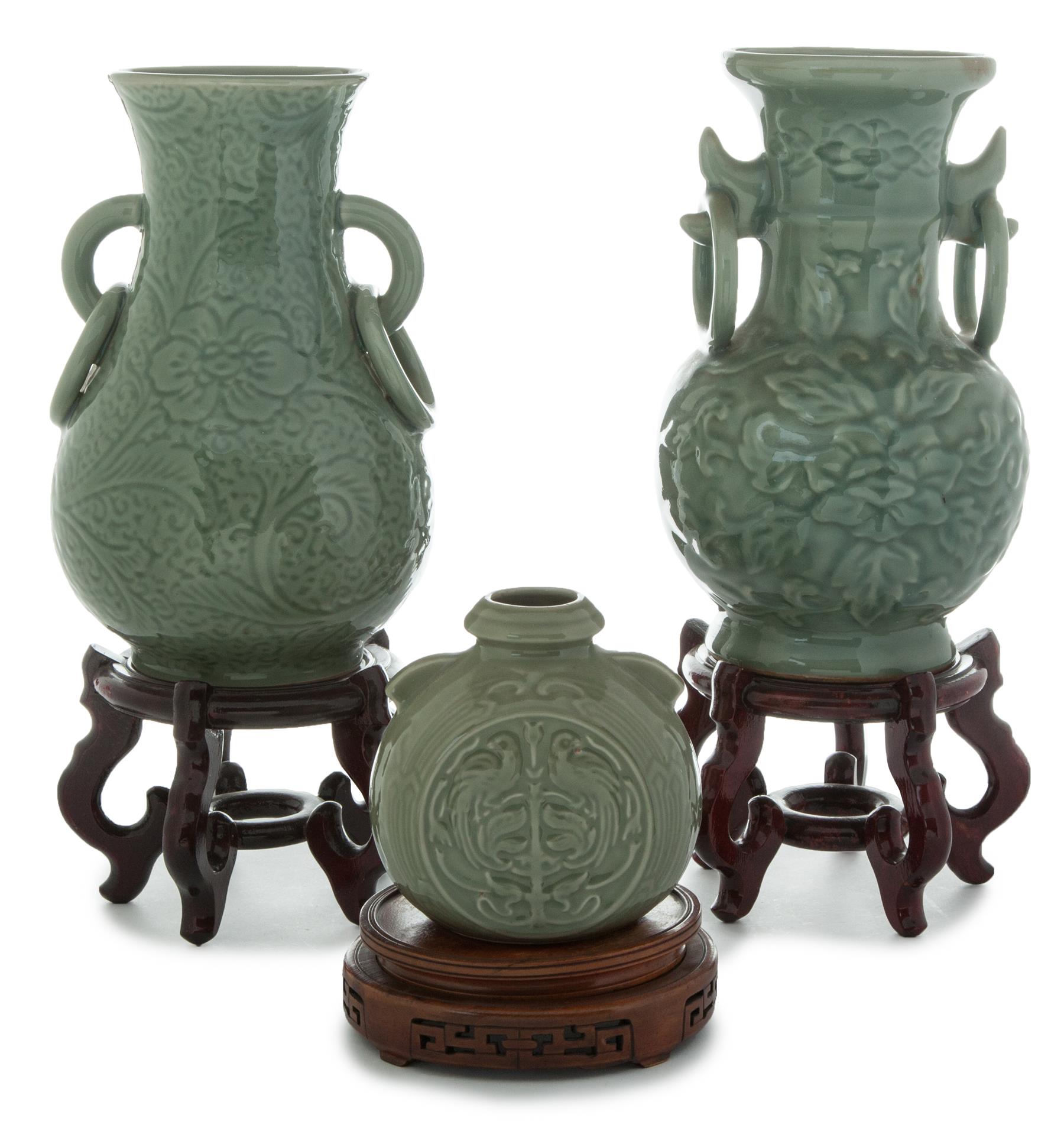 Appraisal: THREE CHINESE CELADON VASES Second half- th century Molded designs