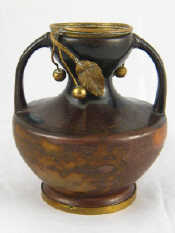 Appraisal: A French ceramic two handled studio vase with brown flambe