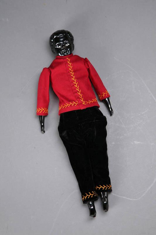 Appraisal: BLACK CHINA HEAD DOLL China head with black paint and