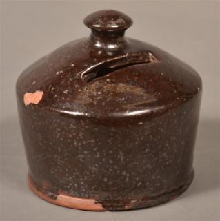 Appraisal: th Century Manganese Glazed Redware Bank Inscribed F H R