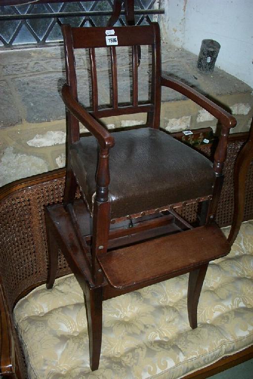 Appraisal: A Georgian mahogany child's elbow chair with stick back and