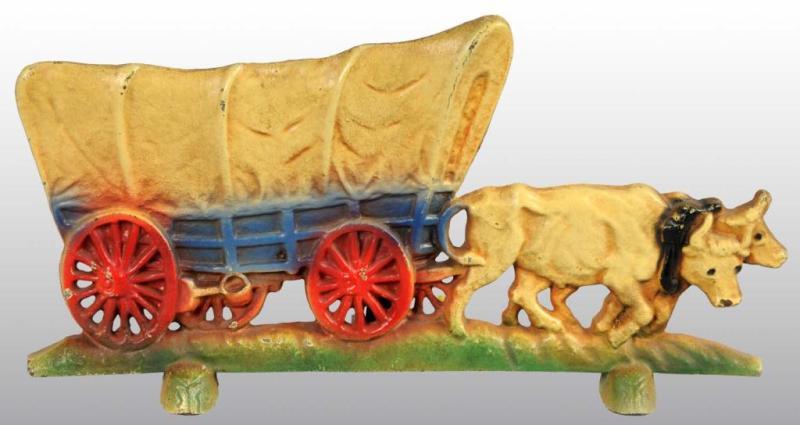 Appraisal: Cast Iron Conestoga Wagon with Oxen Team Doorstop Description Made