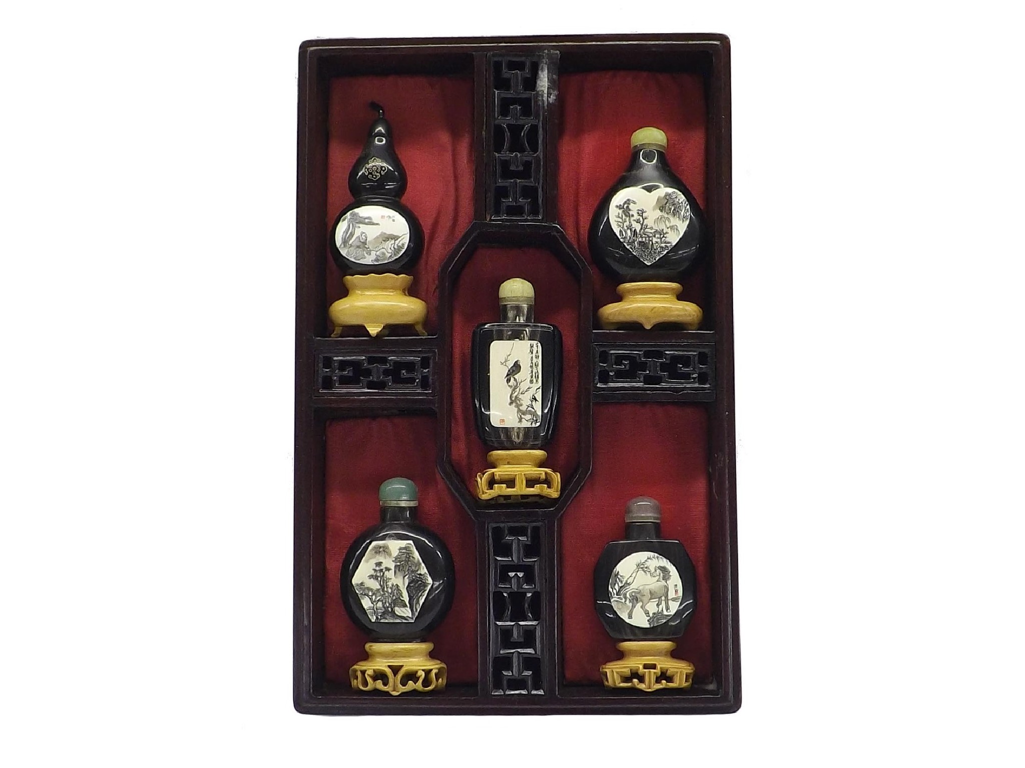 Appraisal: Good set of five various horn snuff bottles and stands