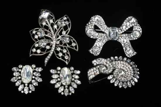 Appraisal: THREE EISENBERG STERLING SILVER AND RHINESTONE BROOCHES AND PAIR COLLAR