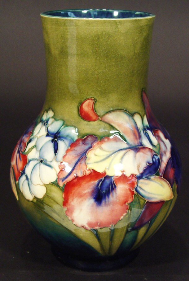 Appraisal: Moorcroft pottery vase hand painted and tubelined with orchids onto