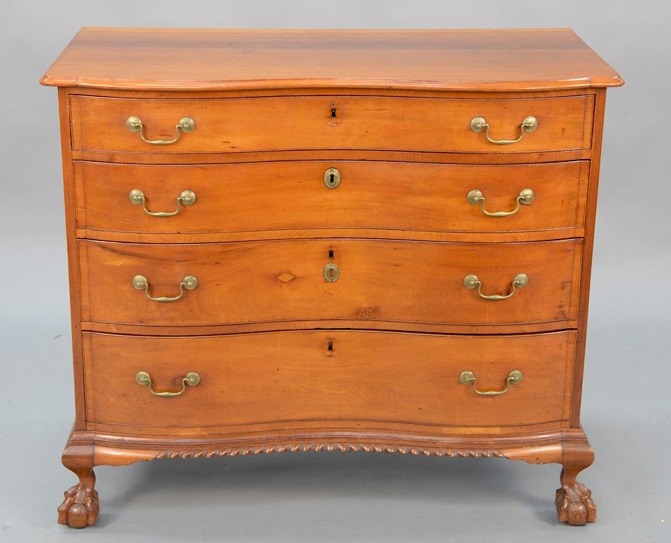 Appraisal: Cherry serpentine chest having serpentine top over four conforming drawers