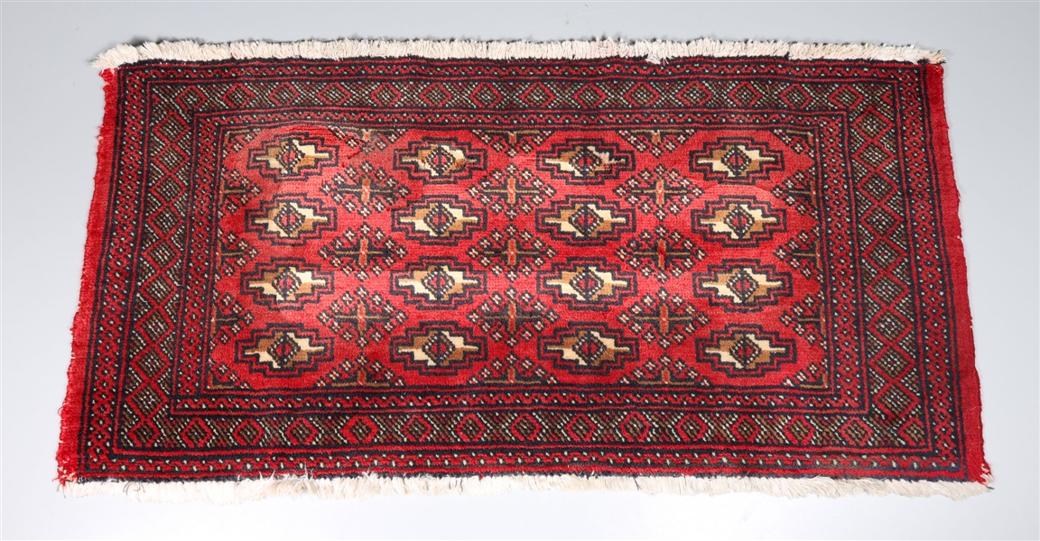 Appraisal: Vintage hand tied Turkish wool area rug in maroon and