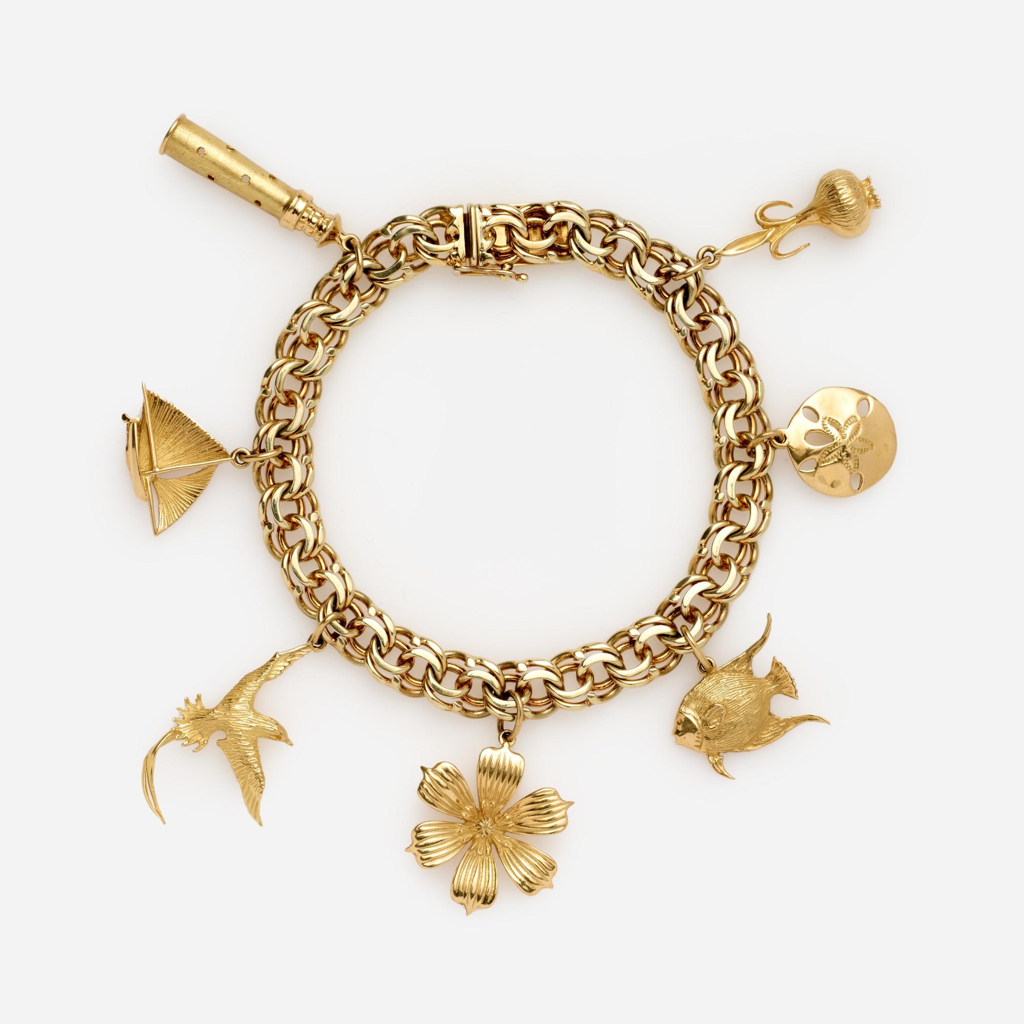 Appraisal: K SEA THEMED CHARM BRACELET WITH K CHARMS A k