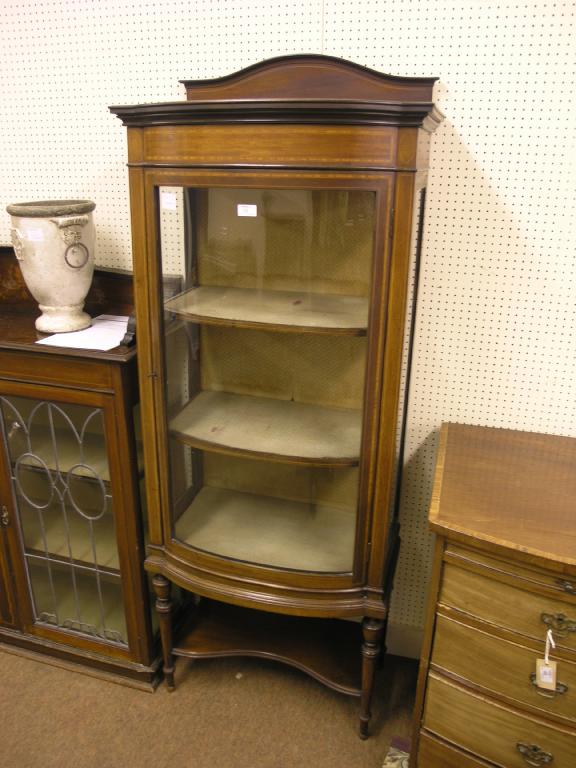 Appraisal: An Edwardian inlaid mahogany display cabinet lined interior with two