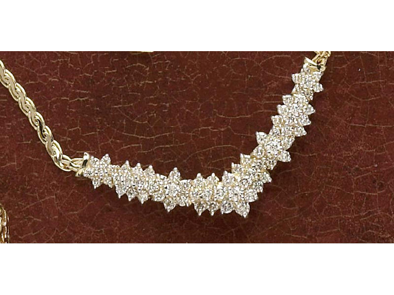 Appraisal: DIAMOND NECKLACE k yellow gold necklace with center plaque set