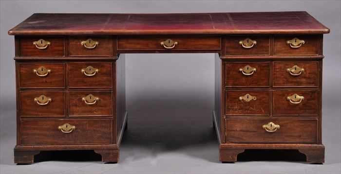 Appraisal: GEORGE III MAHOGANY PARTNER'S DESK The gold-tooled rose leather top