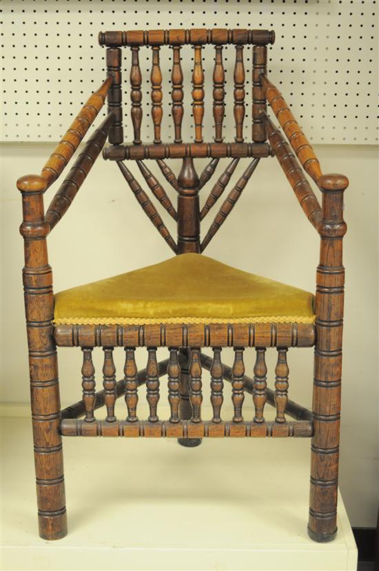 Appraisal: Carver type three leg chair with ring turnings triangular seat