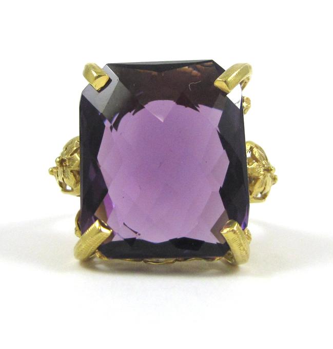 Appraisal: AMETHYST AND FOURTEEN KARAT GOLD SOLITAIRE RING set with a