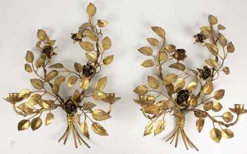 Appraisal: A pair of two-branch two-light wall lights with gilt painted