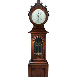 Appraisal: A Gothic Revival Carved Mahogany Tall Case No Astronomical Regulator