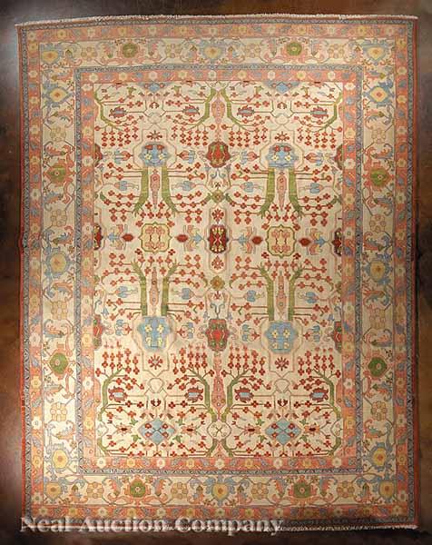 Appraisal: A Large Persian Serapi Carpet camel ground repeating floral motifs