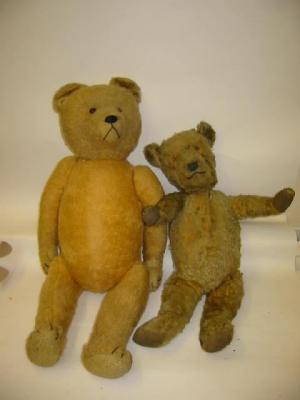 Appraisal: A pre-war English teddy bear covered in gold plush with