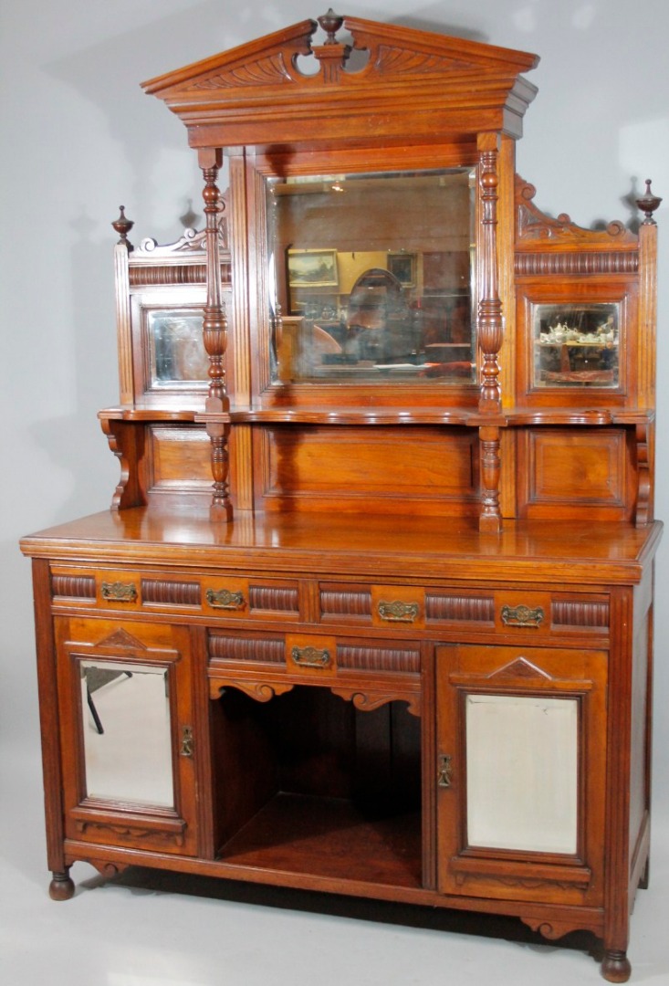 Appraisal: A late thC walnut mirror back sideboard the upper section